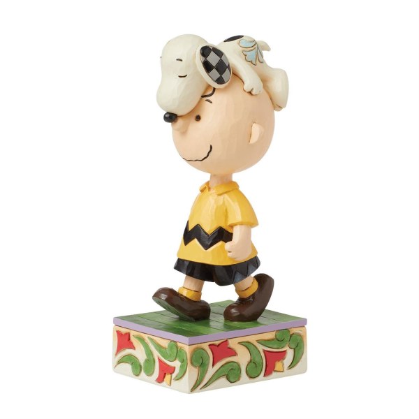 Snoopy auf Charlie Browns Kopf – Peanuts