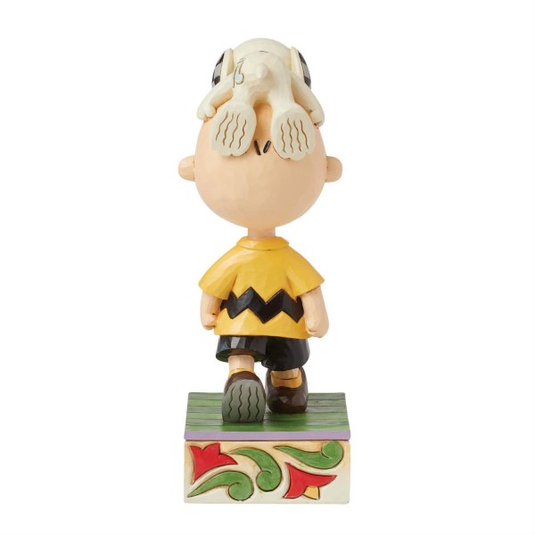 Snoopy auf Charlie Browns Kopf – Peanuts