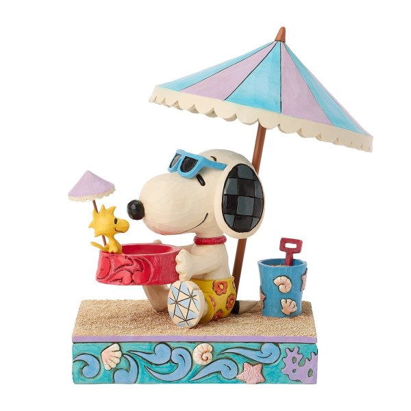 Snoopy hält Woodstock in einer Schüssel am Strand – Peanuts